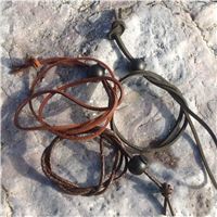 Windstrap securing leather cords
